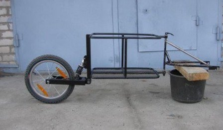 Грузовой велоприцеп с амортизатором